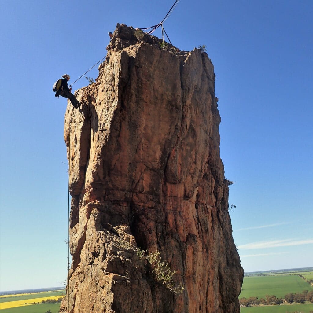 Abseiling from the top of D-Minor, Mount Arapiles